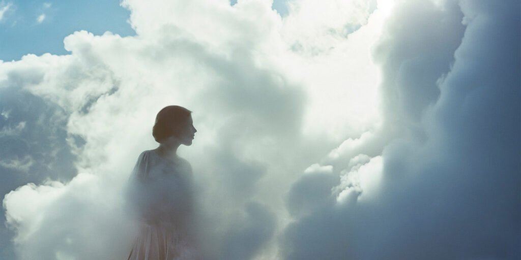 conceptual-scene-with-people-walking-through-clouds
